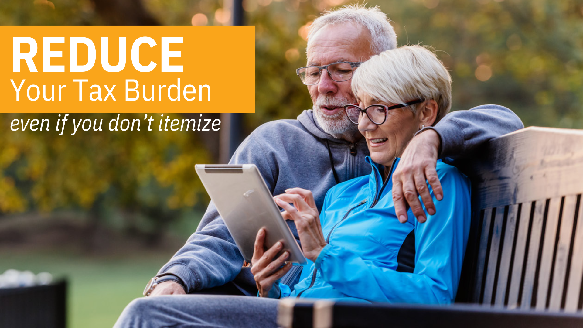 Elderly couple looking at tablet with text "Reduce your tax burden even if you don't itemize"